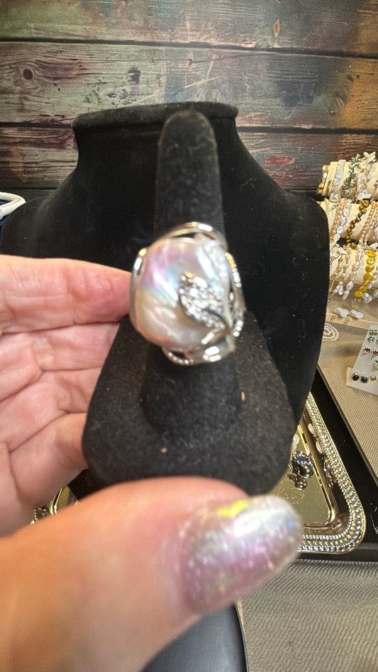Large white baroque adjustable ring in a silver setting