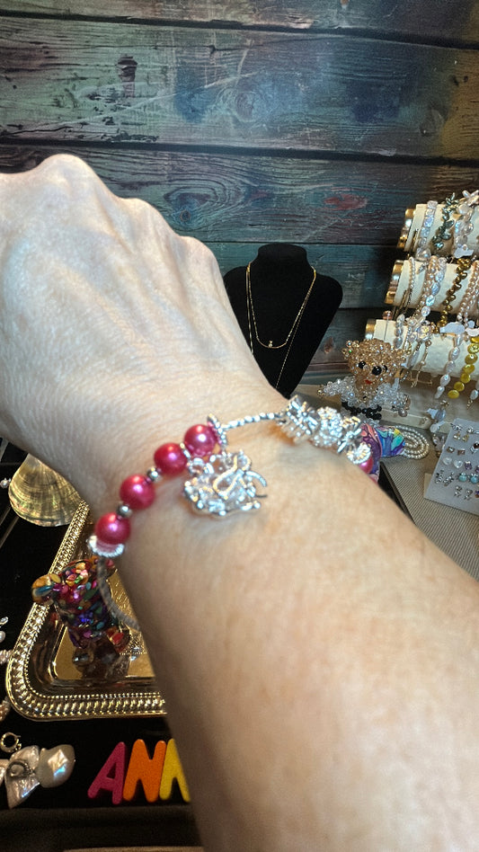 Pink freshwater pearl bangle bracelet with heart charm
