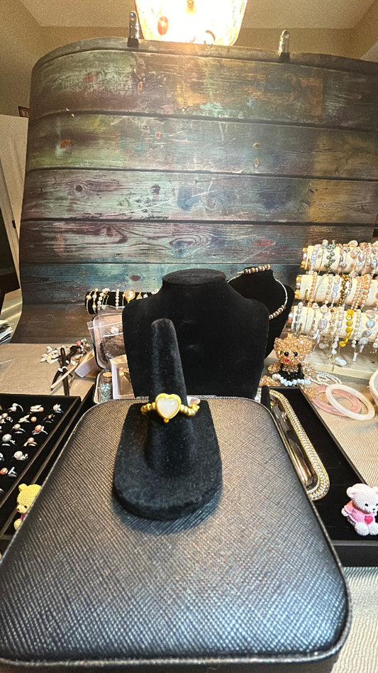 Gold stretch ring with heart