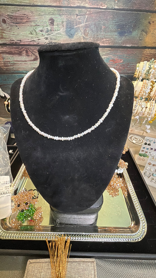 Perfect strand of tiny baby white freshwater pearls