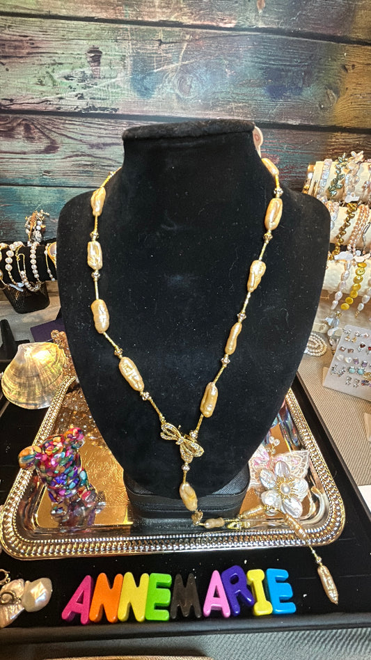 Long golden lariat baroque necklace