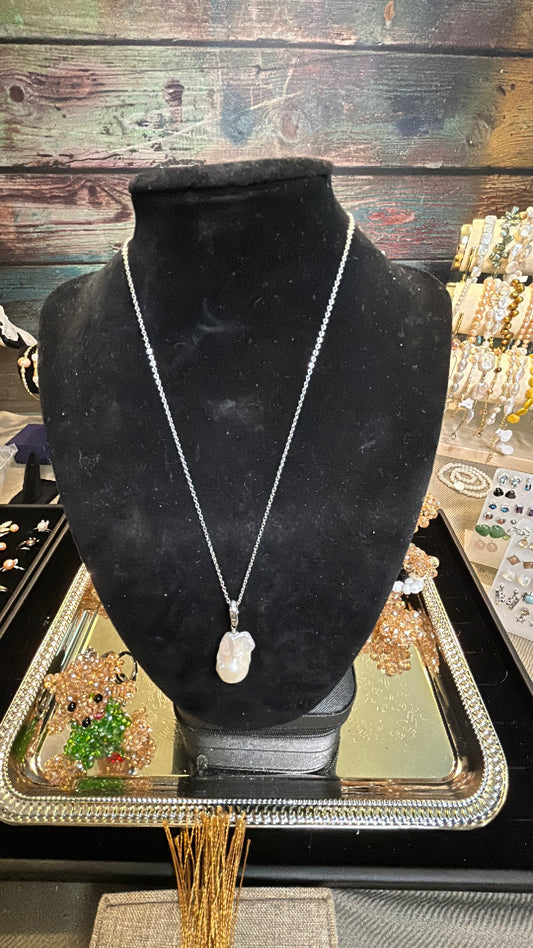 Large white baroque pendant on silver chain